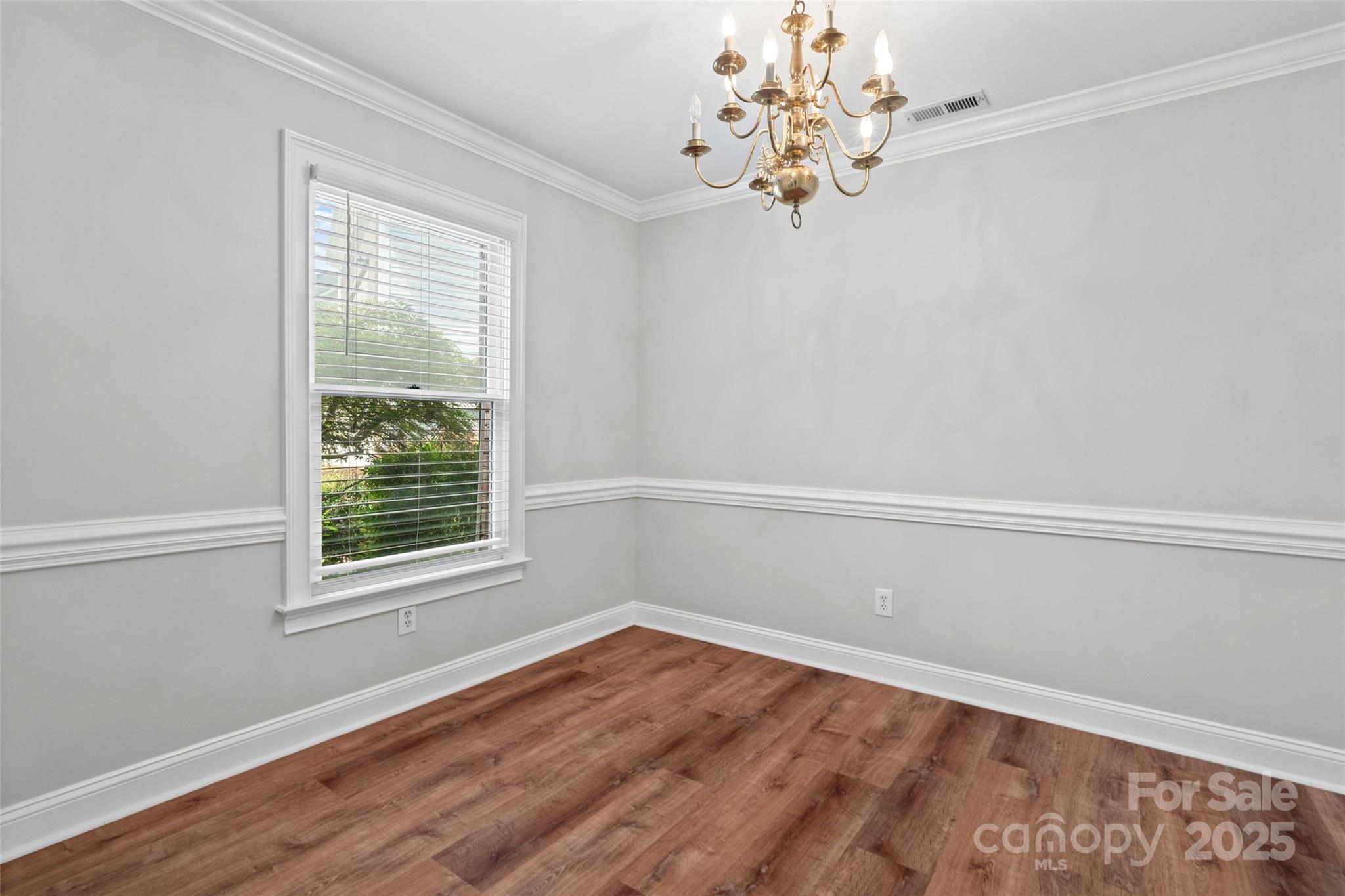 2082 Egret Court Rock Hill, SC 29732 - Photo 3 of 36 a view of an empty room with wooden floor and a window