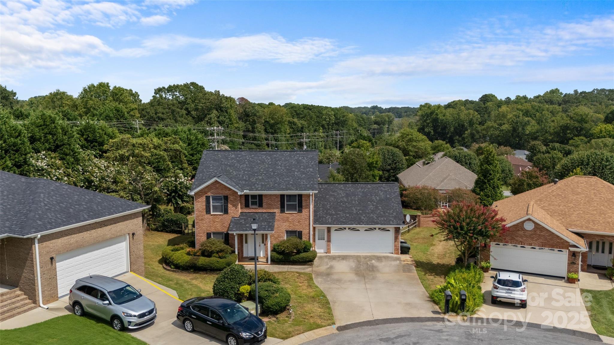 2082 Egret Court Rock Hill, SC 29732 - Photo 35 of 36 a aerial view of a house with table and chairs and a fire pit