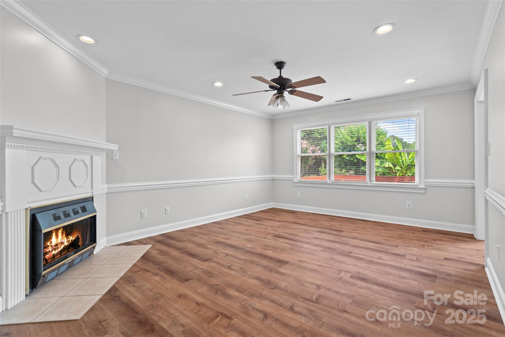 2082 Egret Court Rock Hill, SC 29732 - Photo 5 of 36 a view of an empty room window and wooden floor