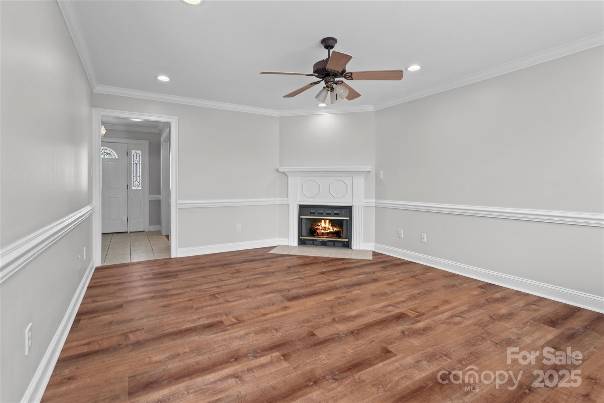 2082 Egret Court Rock Hill, SC 29732 - Photo 7 of 36 a view of an empty room with a fireplace and a window