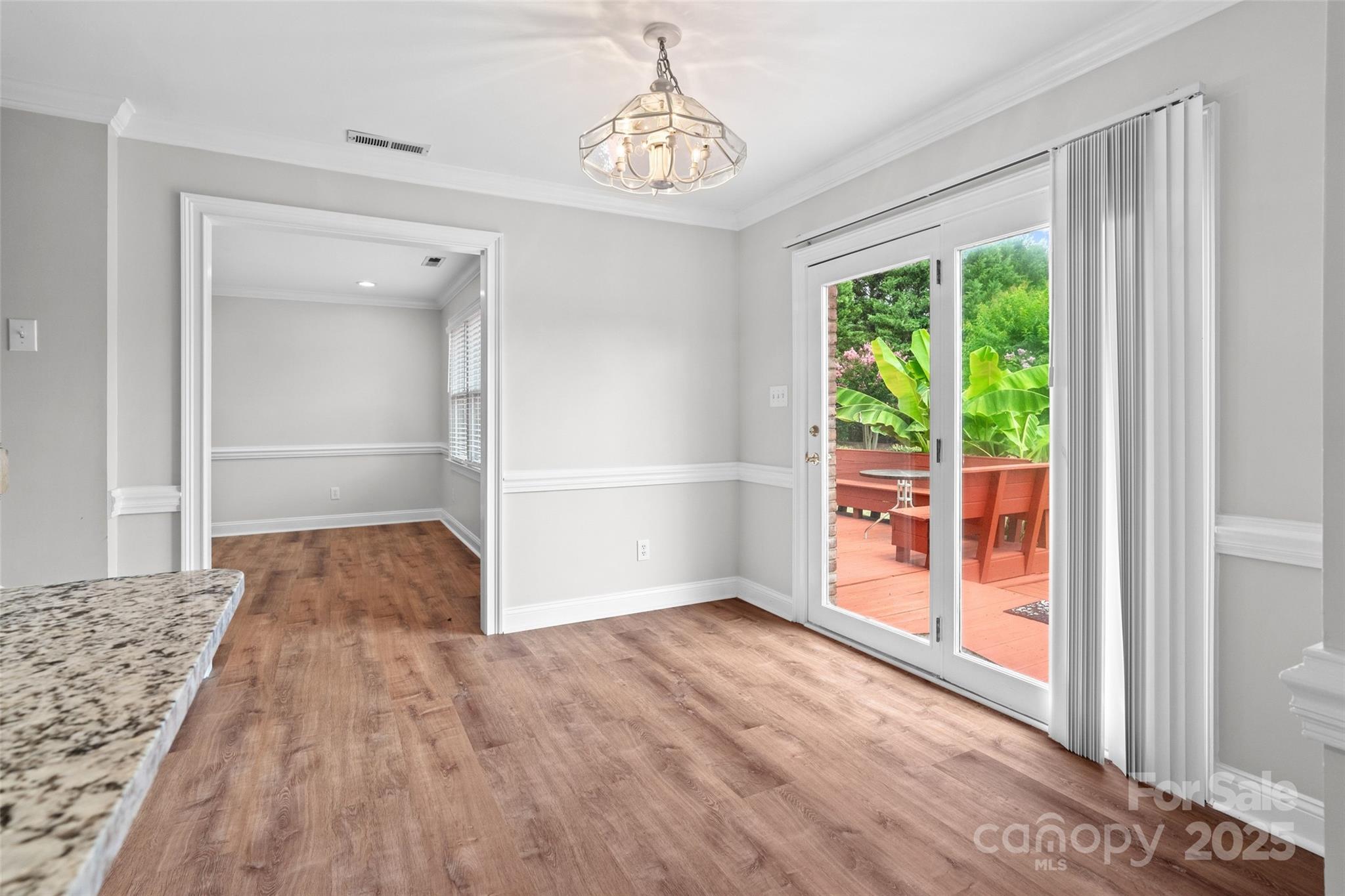 2082 Egret Court Rock Hill, SC 29732 - Photo 10 of 36 a view of empty room with wooden floor and fan
