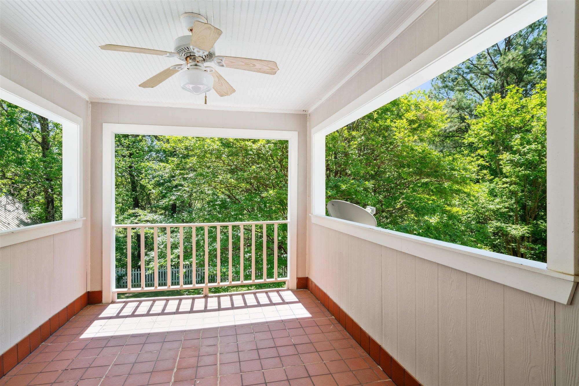 139 Pine Ridge Cove Holly Springs, MS 38635 - Photo 26 of 38 a view of a porch with a floor to ceiling window