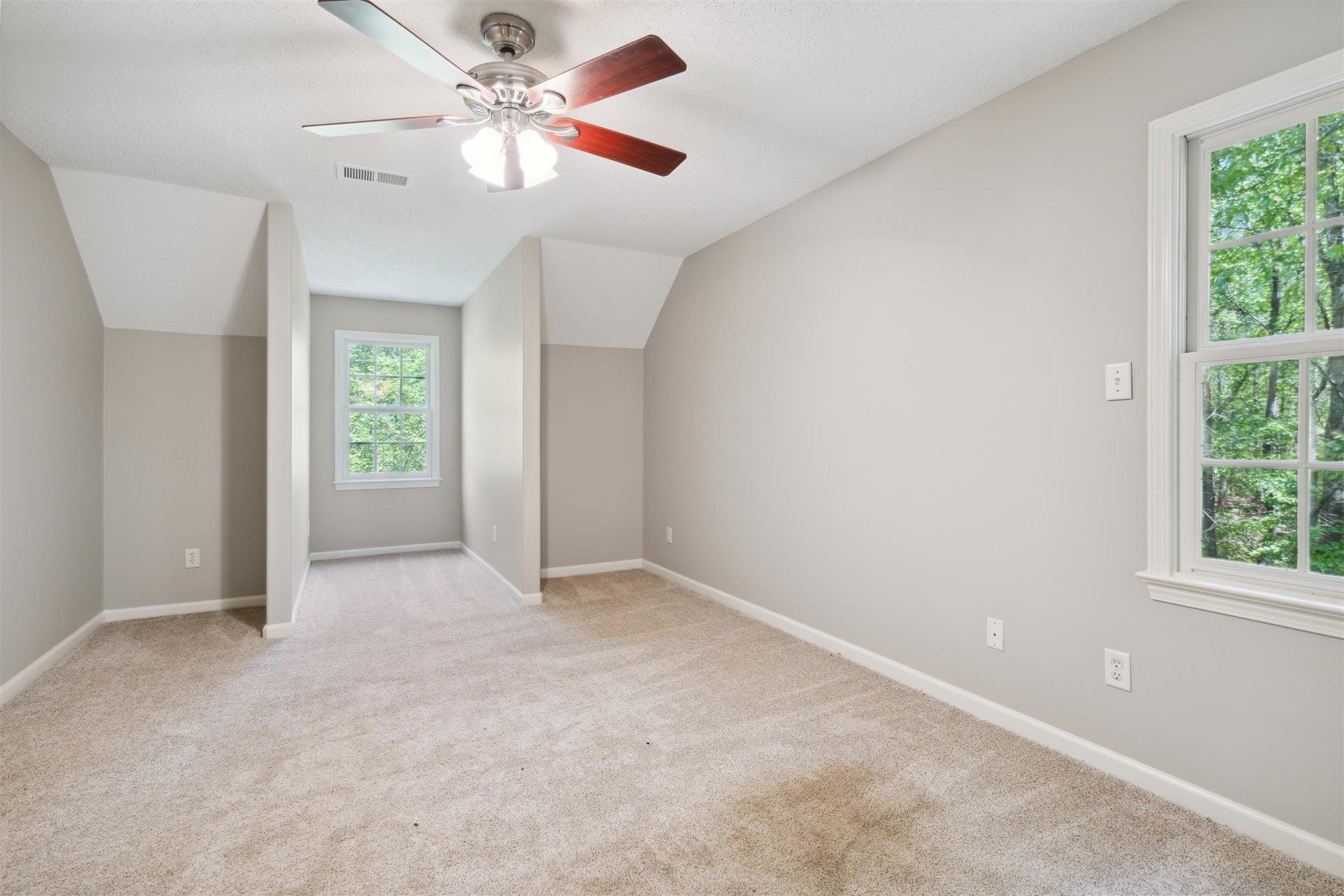 139 Pine Ridge Cove Holly Springs, MS 38635 - Photo 29 of 38 an empty room with fan and windows