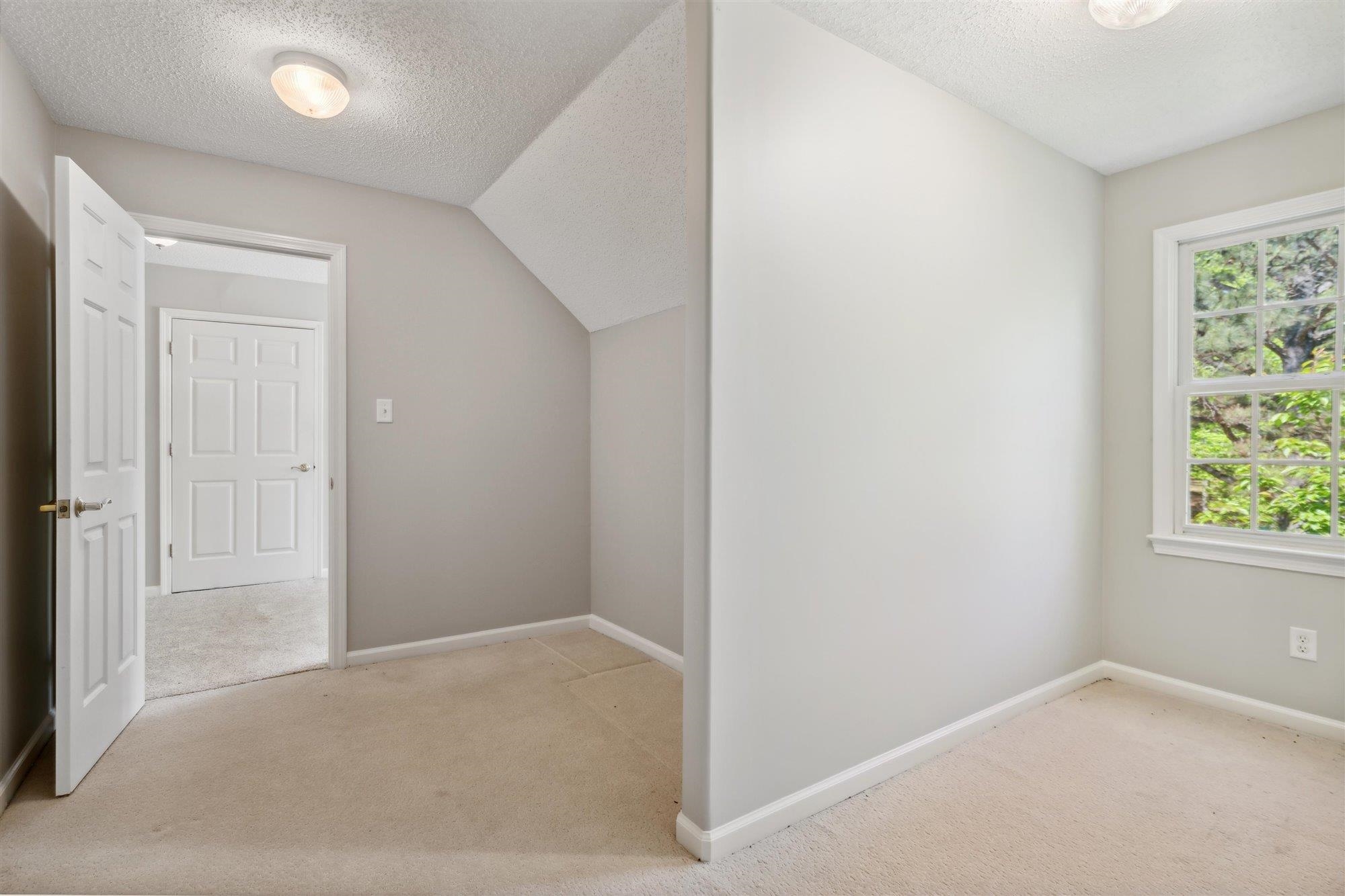 139 Pine Ridge Cove Holly Springs, MS 38635 - Photo 30 of 38 an empty room with windows and closet
