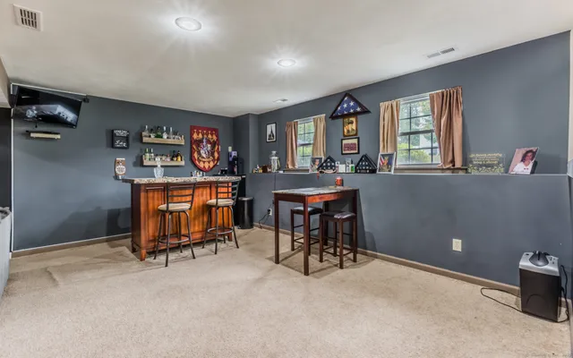 a workspace with furniture and window