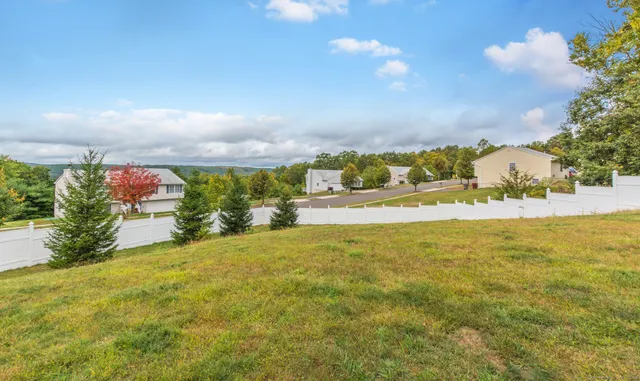 a view of an outdoor space and a yard