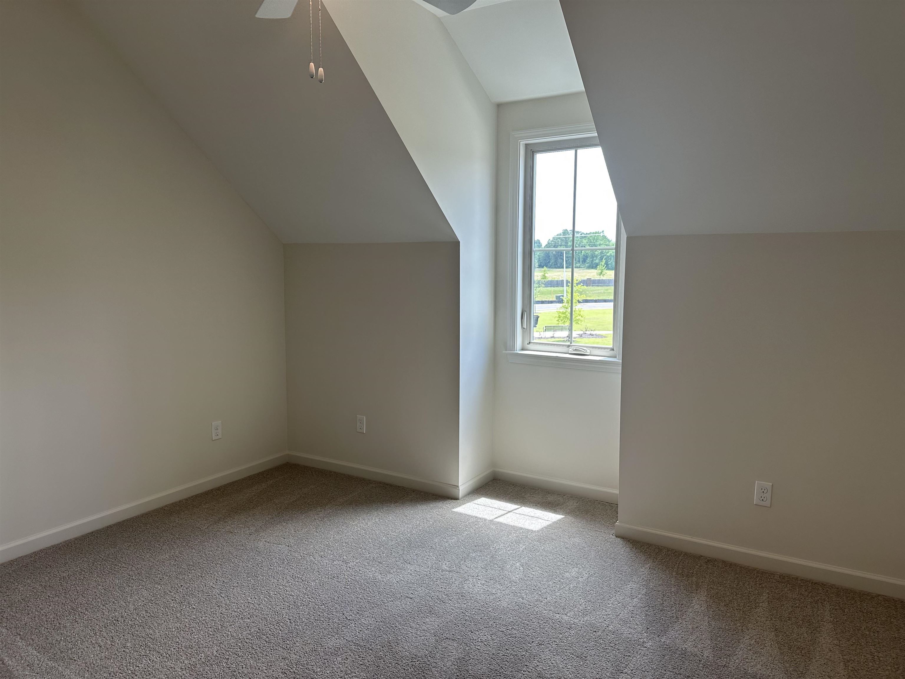 11512 Sunsparkler Way Collierville, TN 38017 - Photo 7 of 9 an empty room with windows