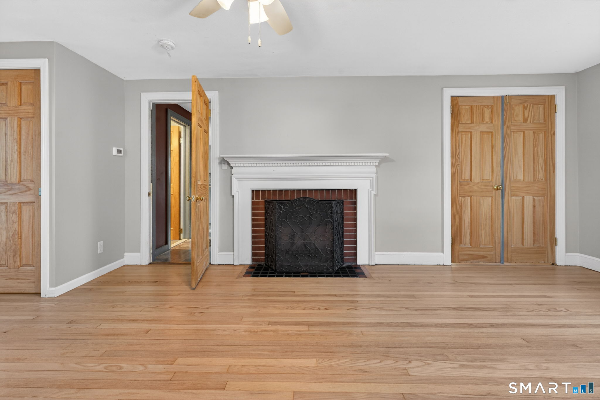 32 Garvan Street Newington, CT 06111 - Photo 13 of 36 a view of an empty room with wooden floor and a window