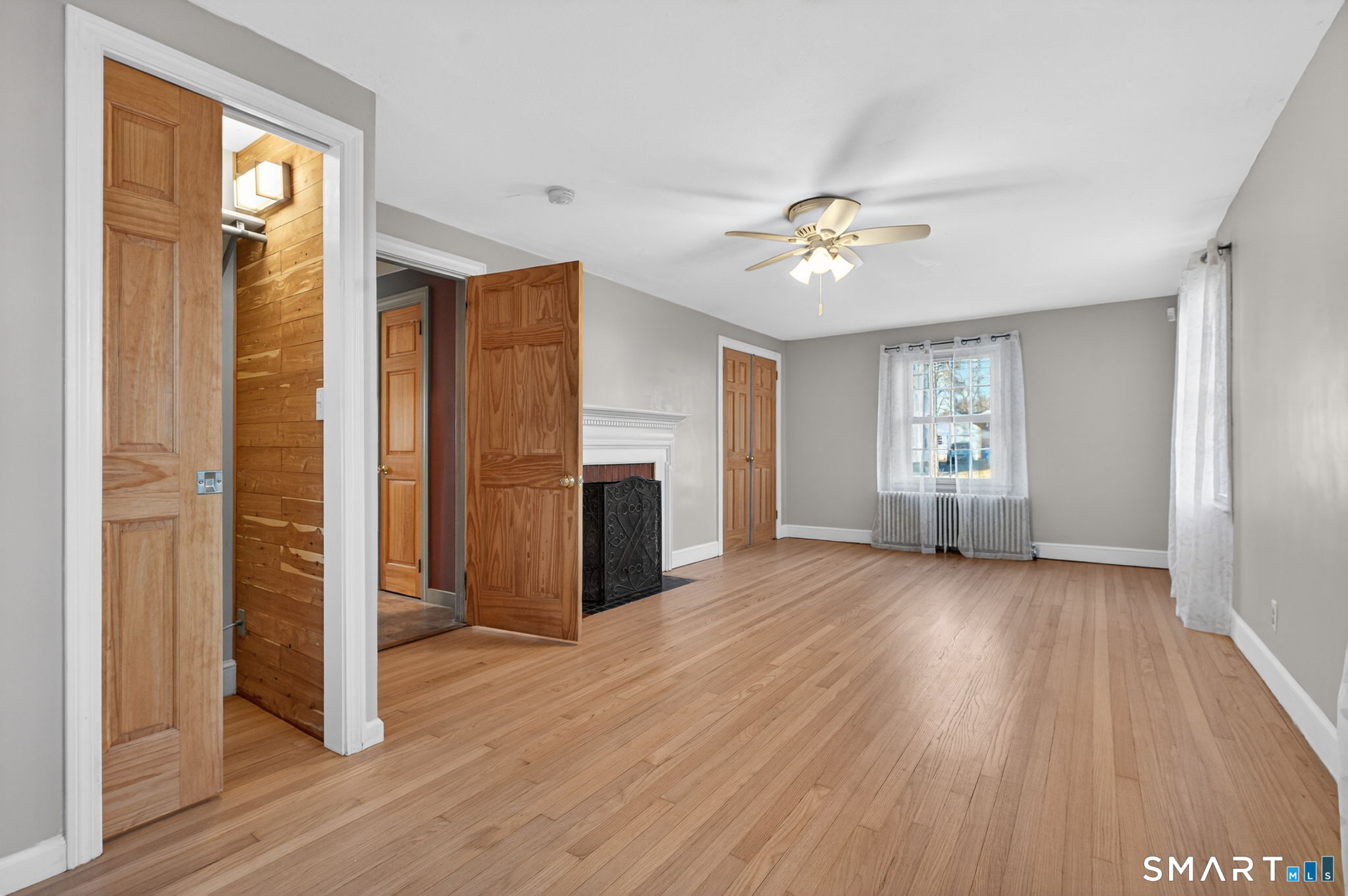 32 Garvan Street Newington, CT 06111 - Photo 14 of 36 wooden floor in an empty room with a window