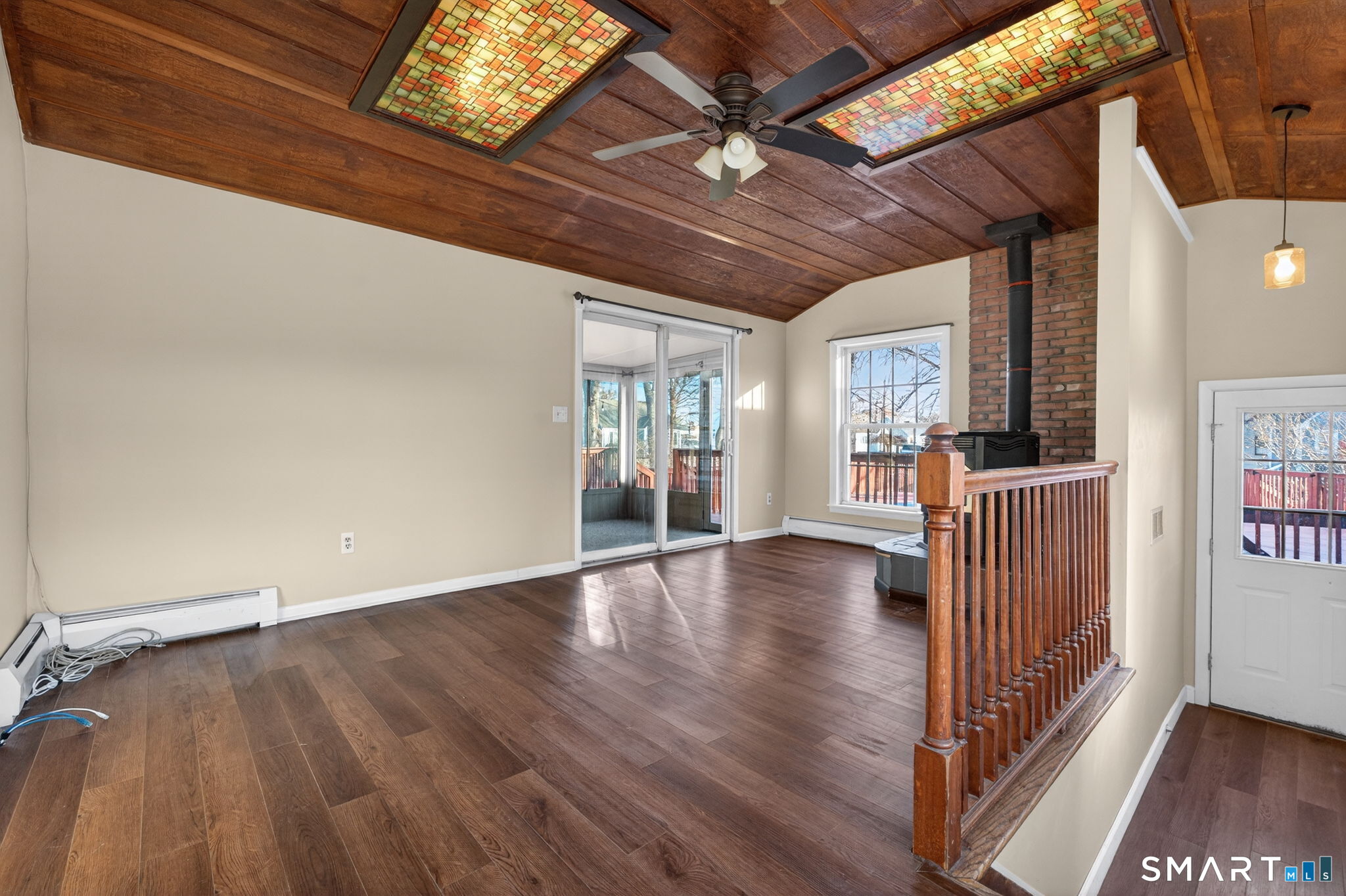 32 Garvan Street Newington, CT 06111 - Photo 17 of 36 a view of an empty room with wooden floor and a window
