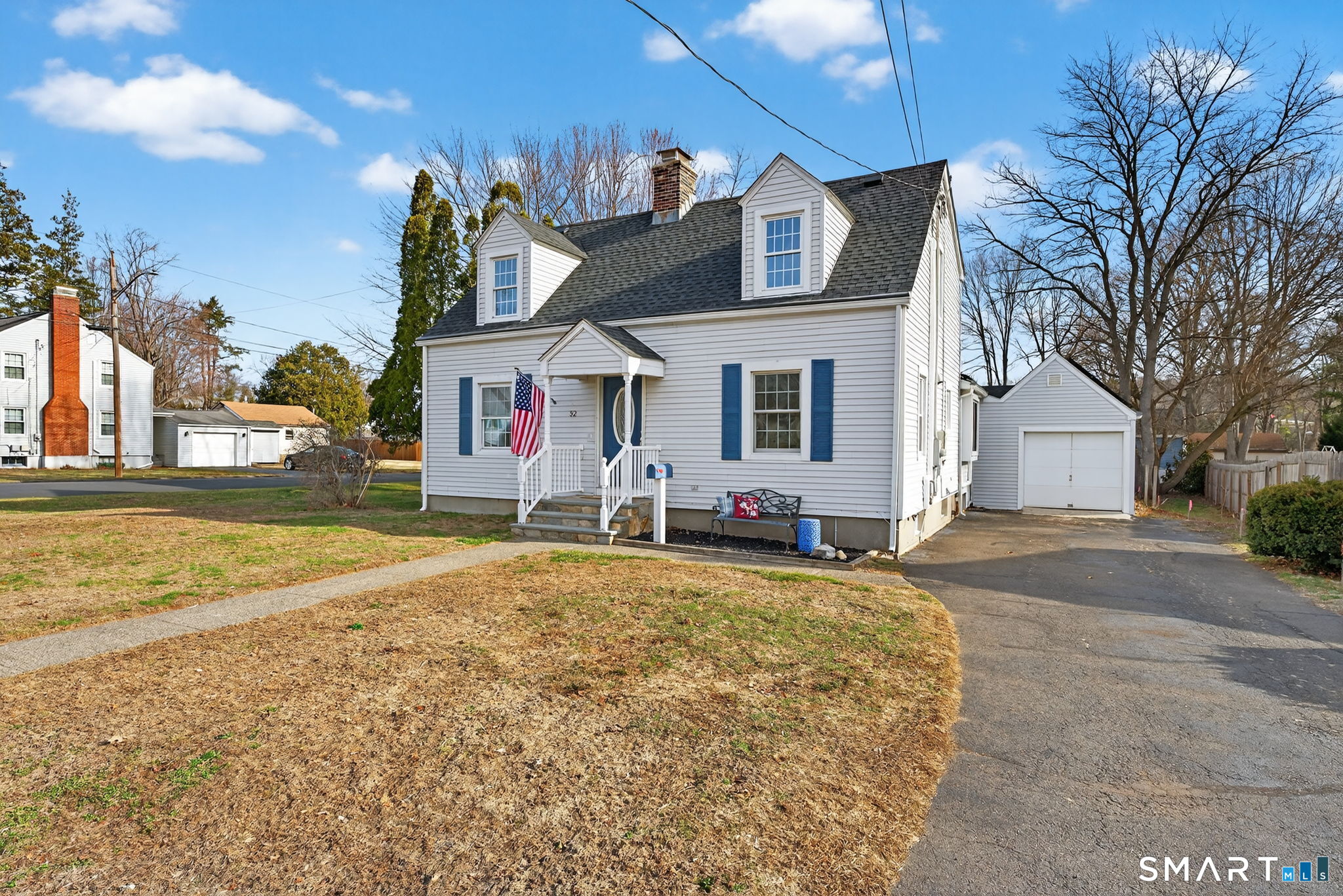 32 Garvan Street Newington, CT 06111 - Photo 3 of 36 a front view of a house with a yard