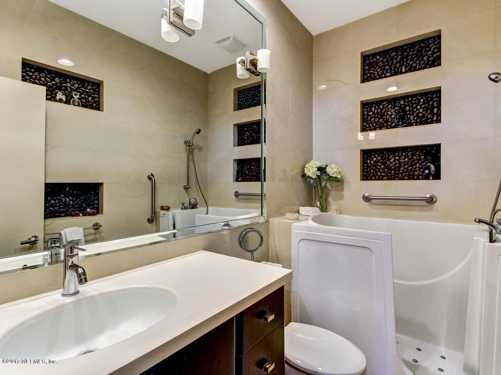 3039 Front Road Jacksonville, FL 32257 - Photo 54 of 71 a bathroom with a sink toilet and shower