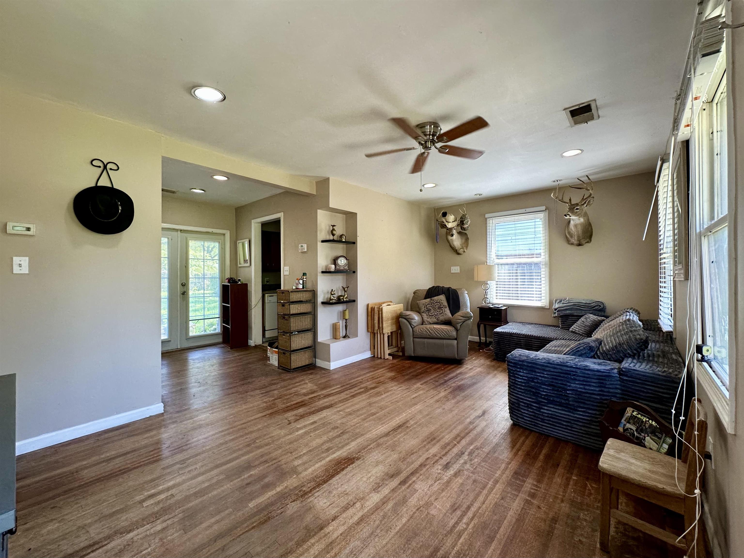 4544 Quince Road Memphis, TN 38117 - Photo 2 of 11 a living room with furniture and wooden floor