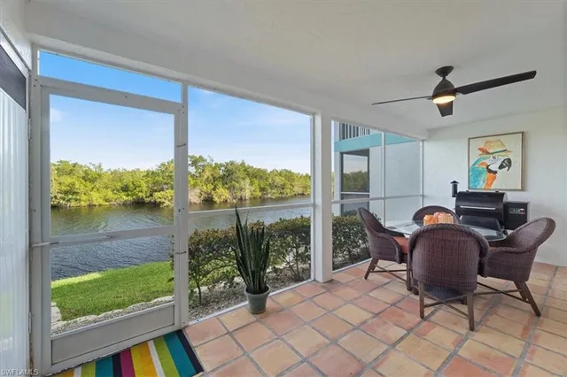 a workspace with furniture and a window