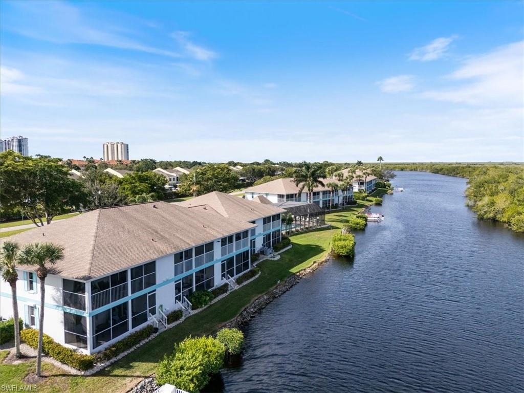 1375 Mainsail Drive, Unit 1702 Naples, FL 34114 - Photo 7 of 38 a view of a house with a ocean view