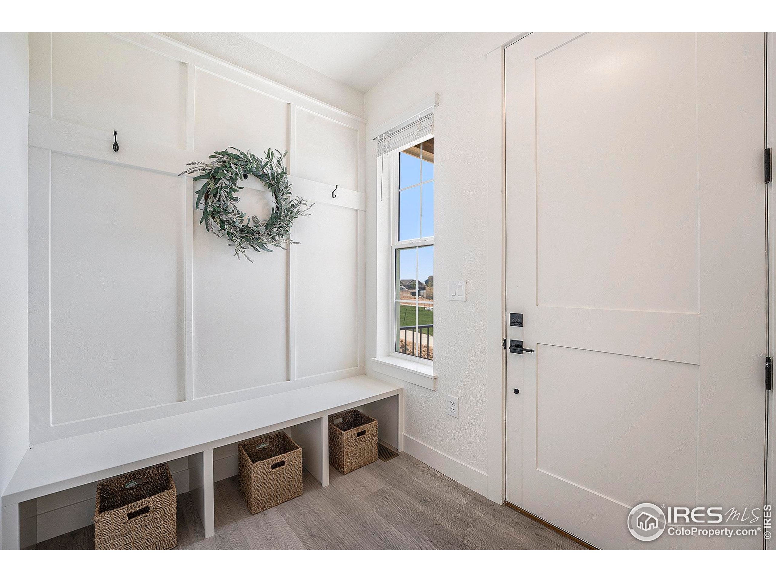 5001 Avon Avenue Loveland, CO 80538 - Photo 5 of 16 a view of workspace with wooden floor