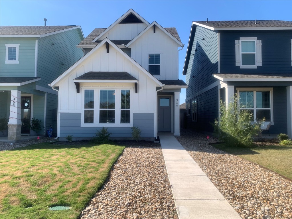 a view of a house with a garden