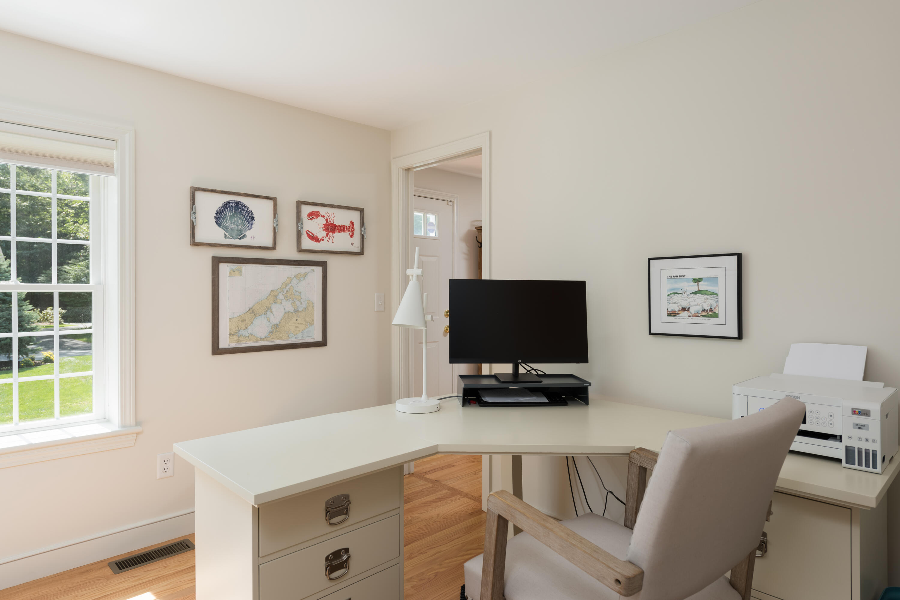 68 Tupelo Road Marstons Mills, MA 02648 - Photo 18 of 29 a view of a livingroom with furniture and a flat screen tv