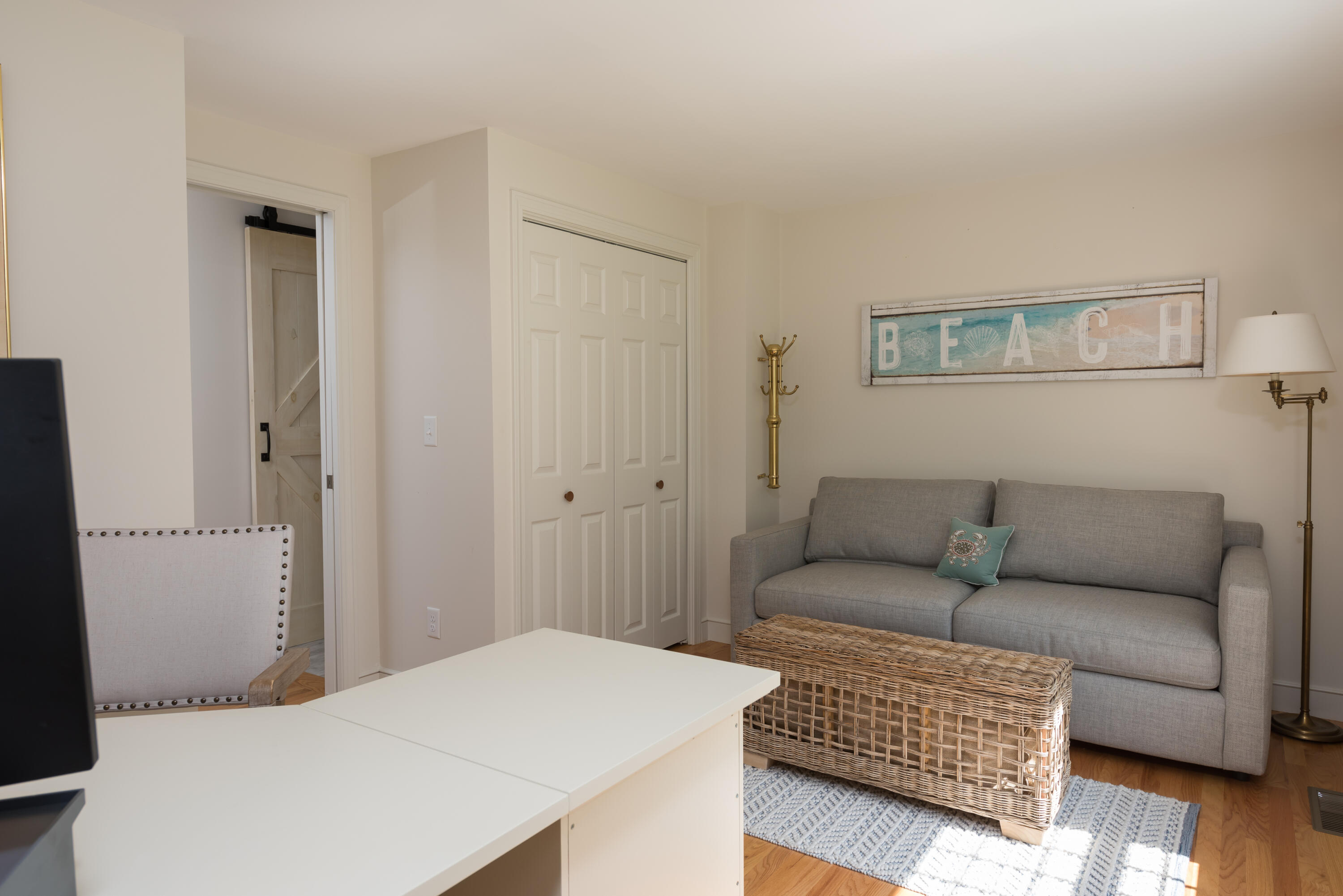 68 Tupelo Road Marstons Mills, MA 02648 - Photo 19 of 29 a living room with furniture and a wooden floor
