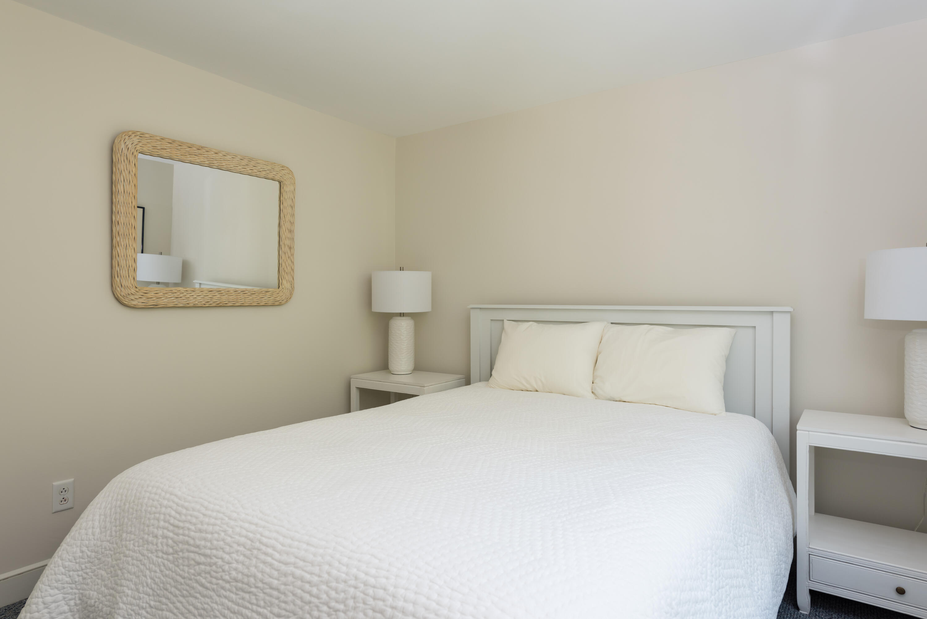 68 Tupelo Road Marstons Mills, MA 02648 - Photo 26 of 29 a bedroom with a bed and a lamp