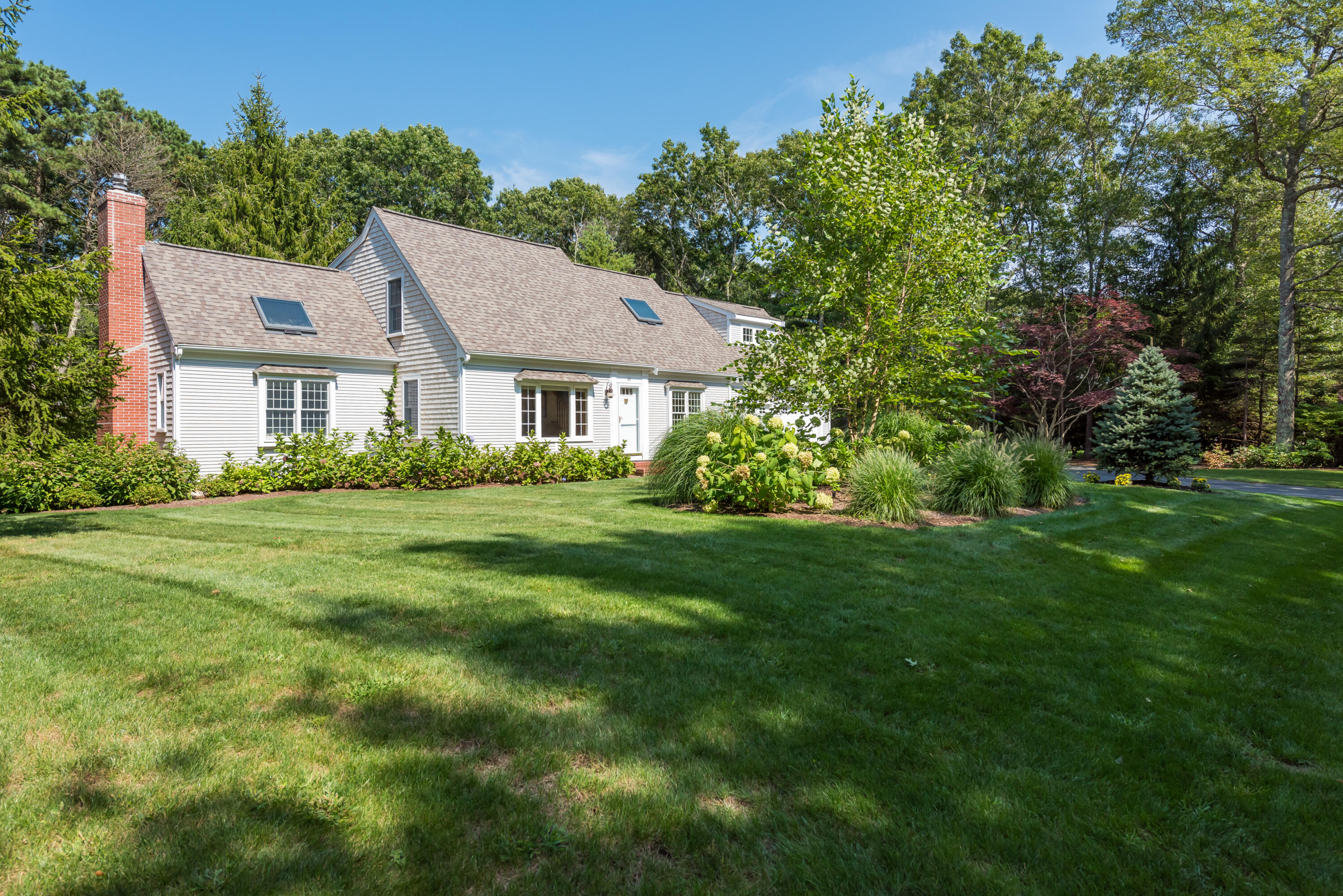 68 Tupelo Road Marstons Mills, MA 02648 - Photo 3 of 29 a front view of house with yard and green space