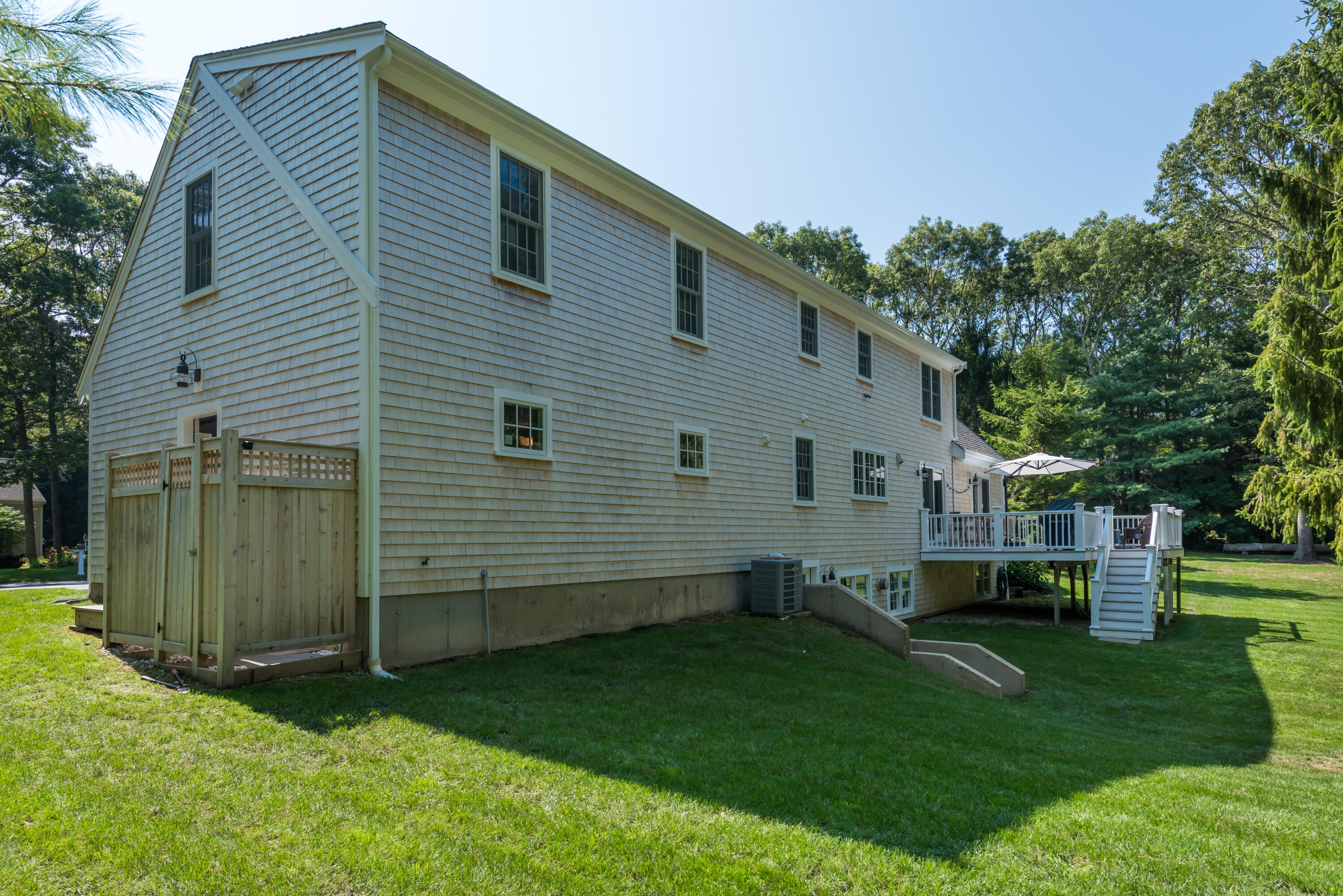 68 Tupelo Road Marstons Mills, MA 02648 - Photo 5 of 29 a view of house with backyard