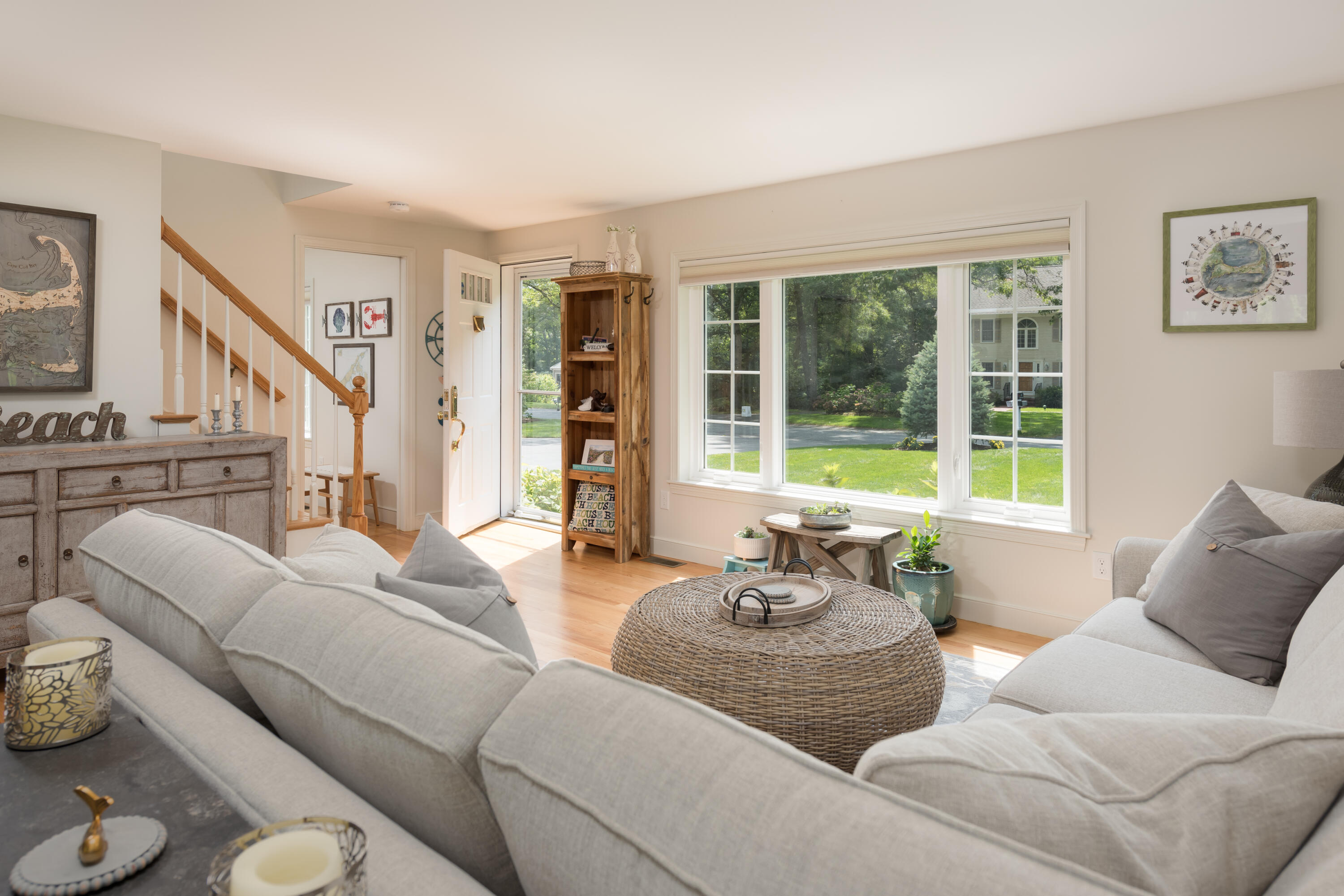 68 Tupelo Road Marstons Mills, MA 02648 - Photo 8 of 29 a living room with furniture and a large window