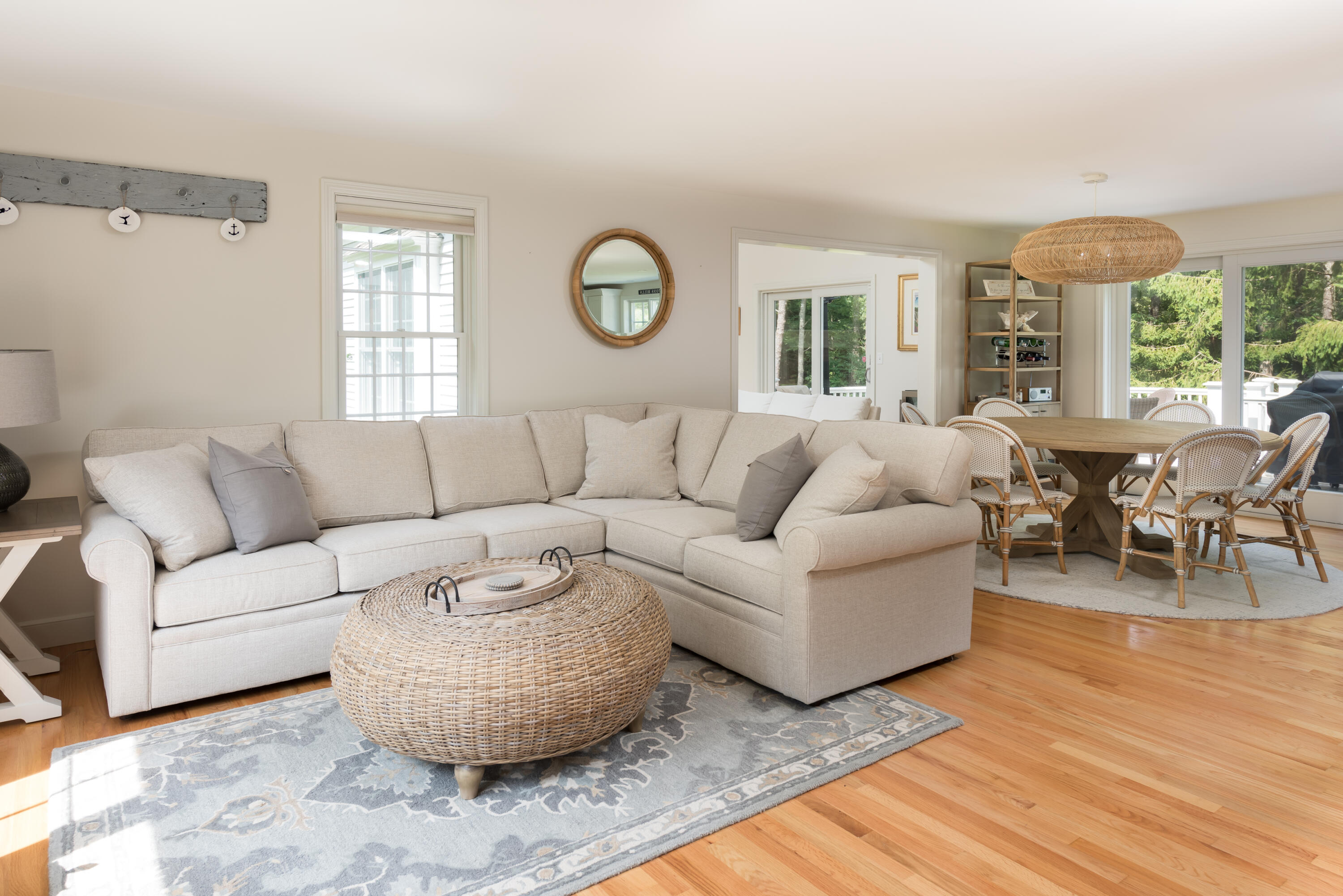 68 Tupelo Road Marstons Mills, MA 02648 - Photo 9 of 29 a living room with furniture and a large window