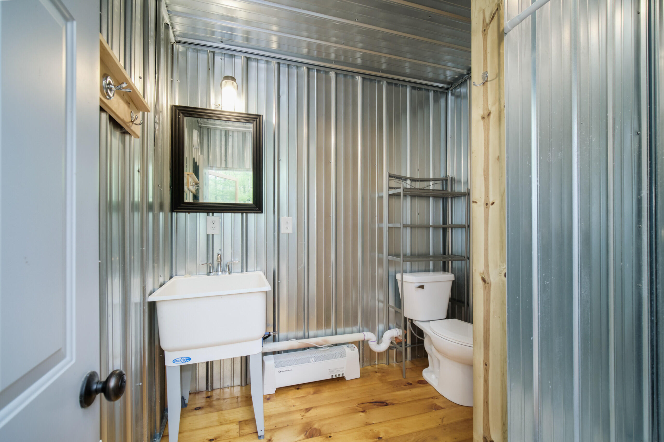 677 Snyder Road Wellston, MI 49689 - Photo 14 of 37 Toilet, sink and heater