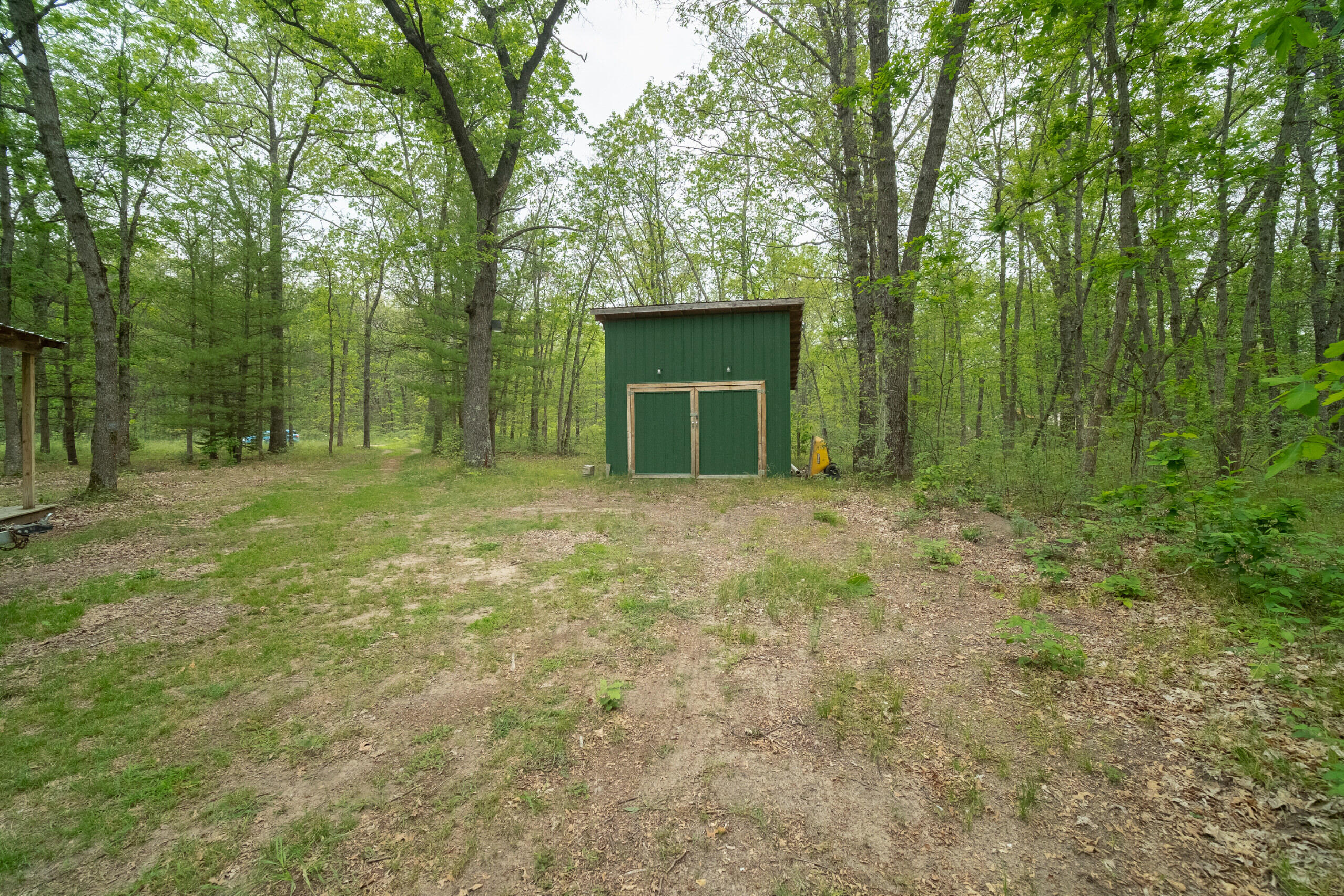 677 Snyder Road Wellston, MI 49689 - Photo 16 of 37 Exterior of garage