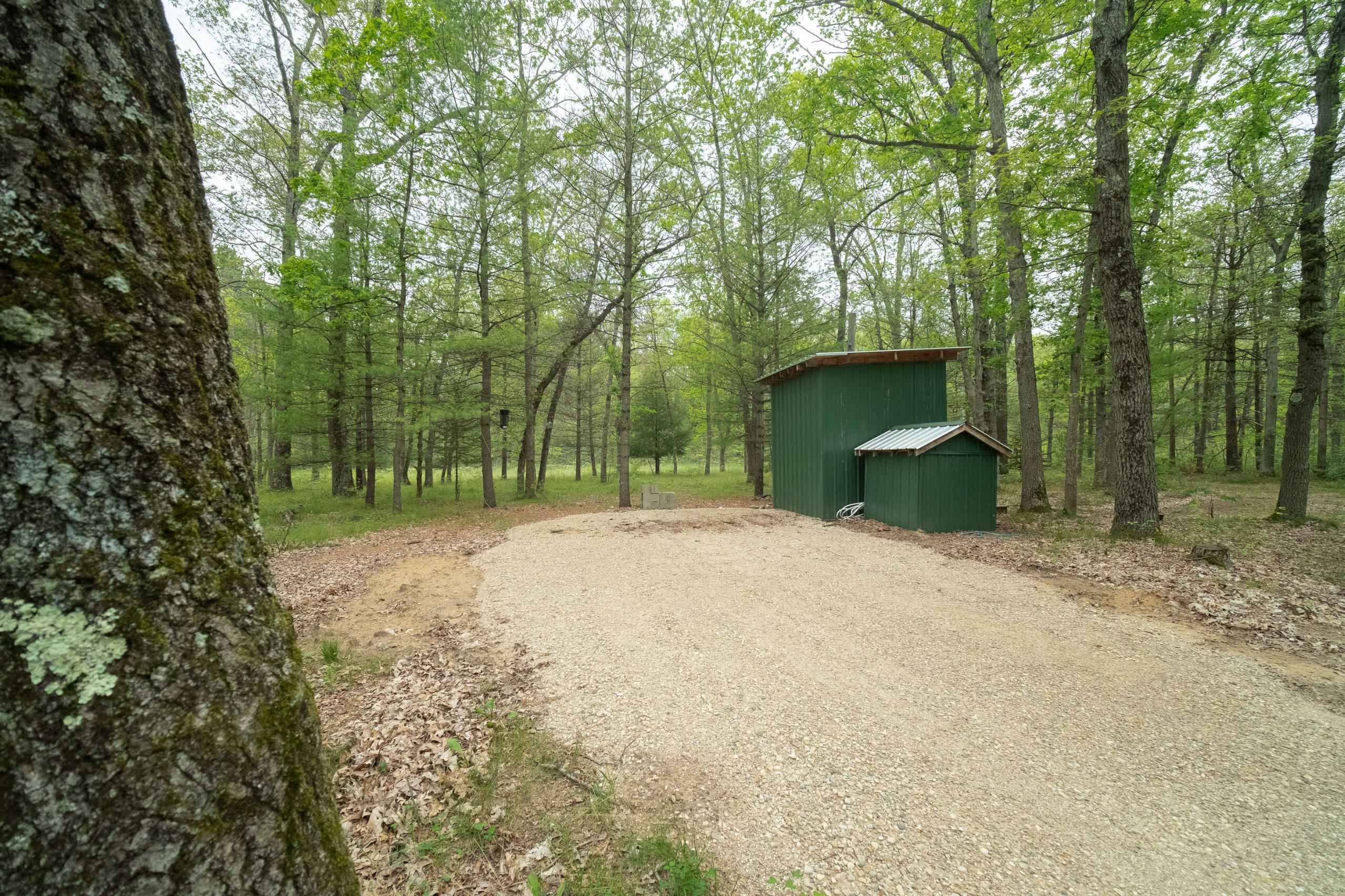 677 Snyder Road Wellston, MI 49689 - Photo 21 of 37 RV parking pad with hook-ups