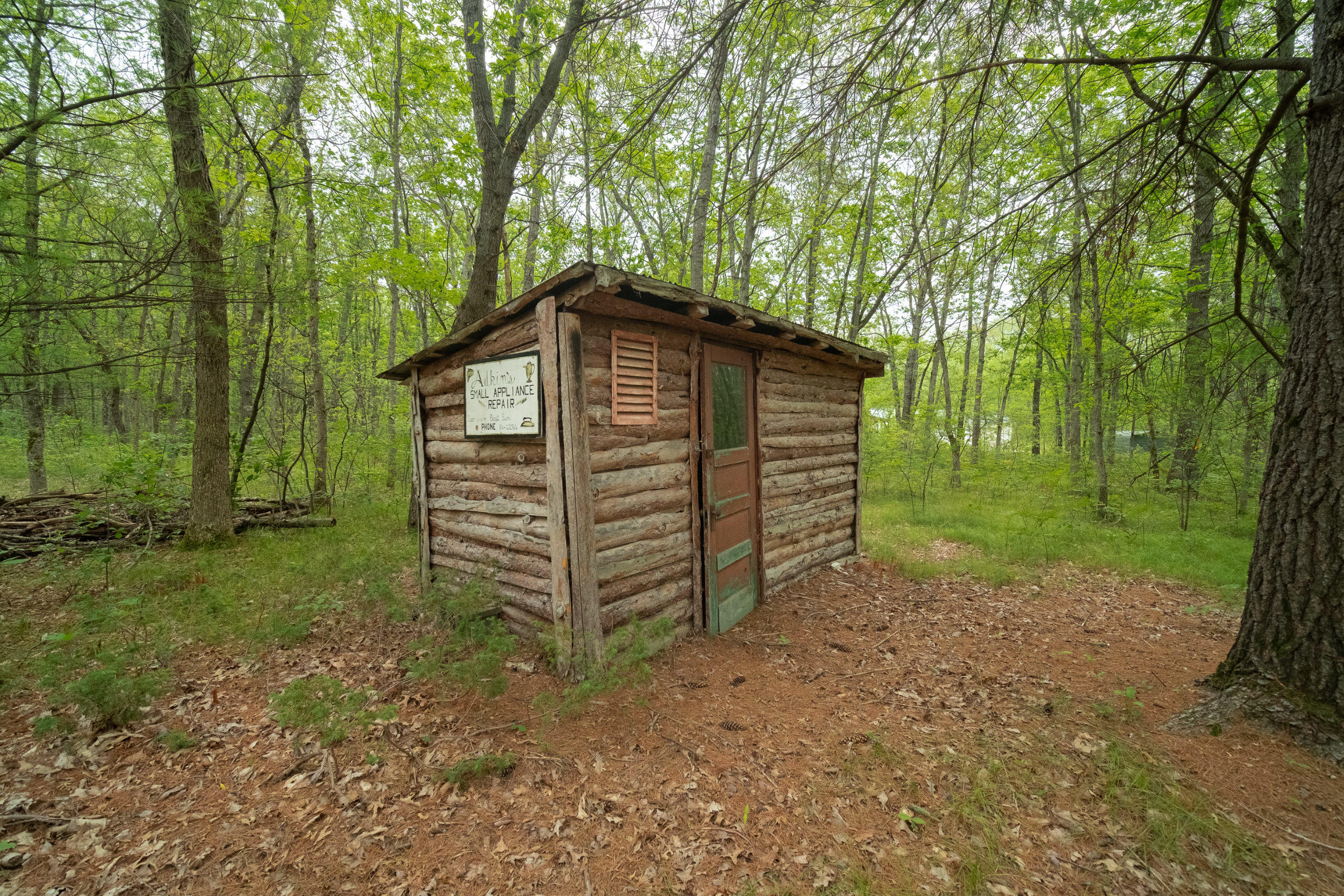677 Snyder Road Wellston, MI 49689 - Photo 23 of 37 Original log outhouse