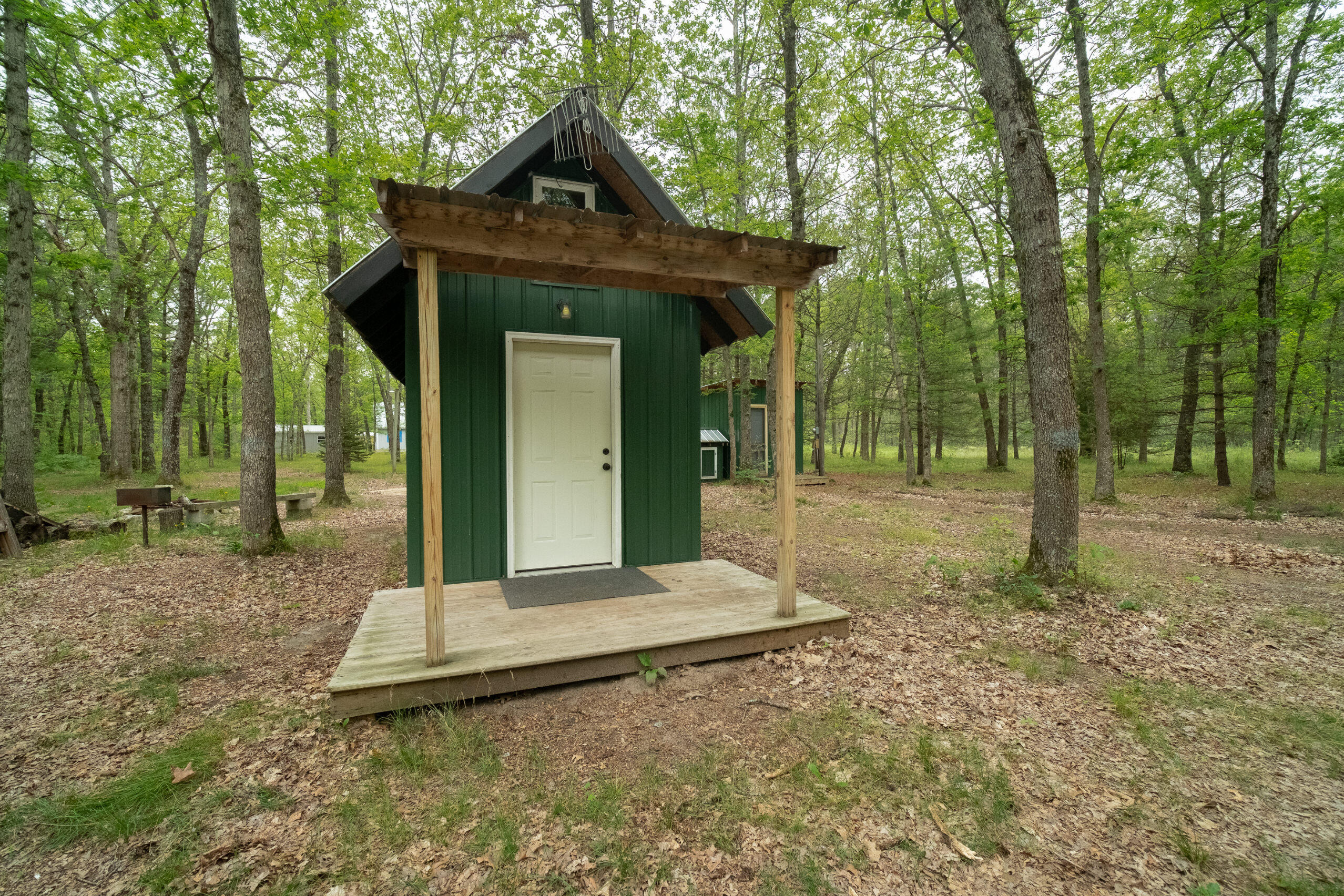677 Snyder Road Wellston, MI 49689 - Photo 3 of 37 Covered front porch on tiny house