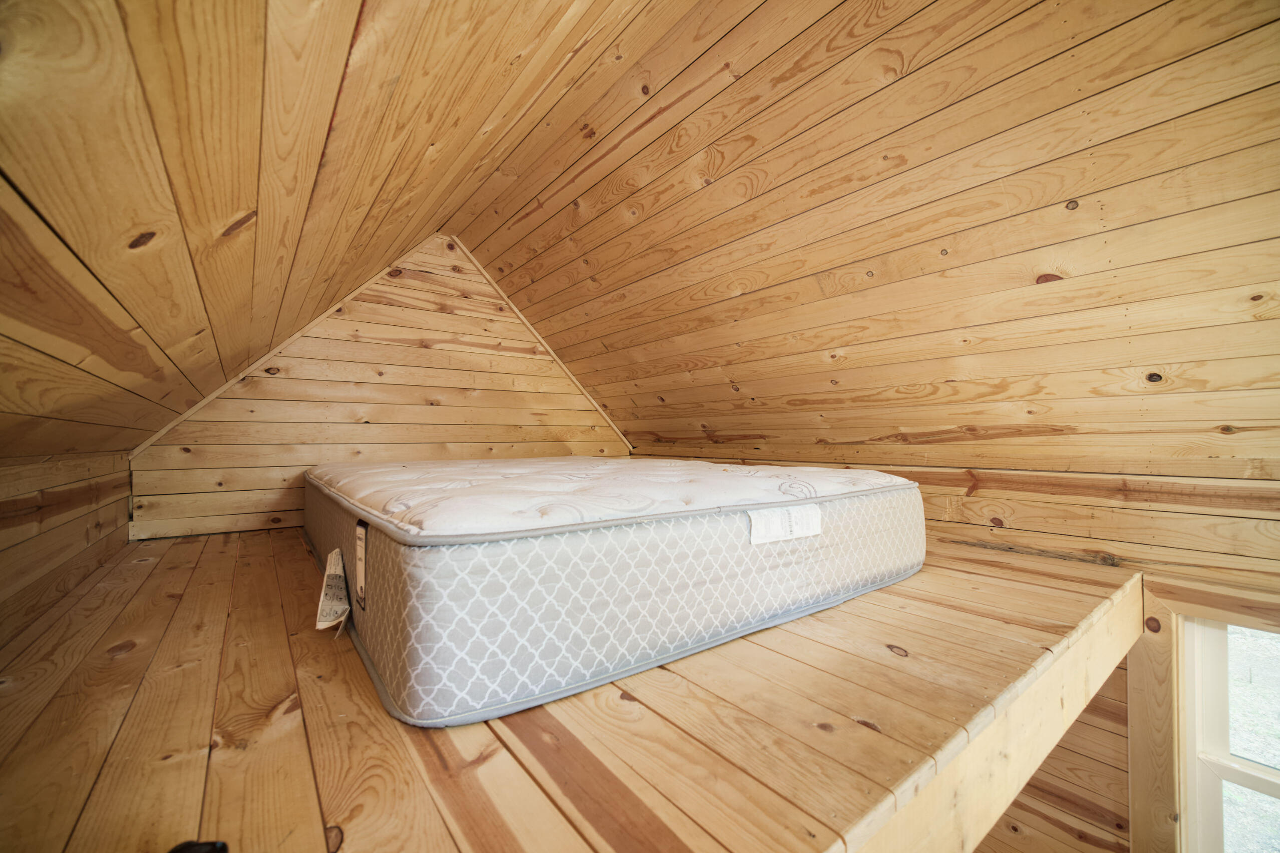 677 Snyder Road Wellston, MI 49689 - Photo 10 of 37 Queen mattress in loft area