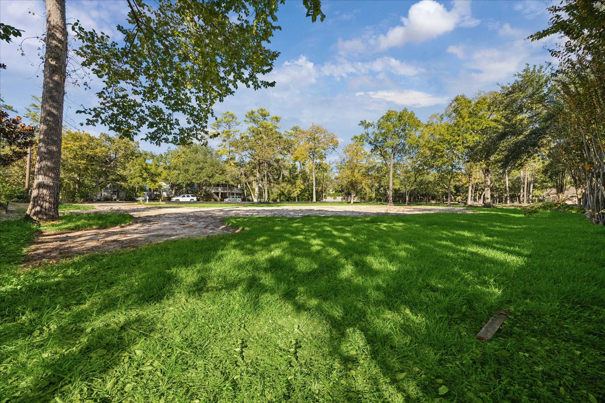 12003 Tall Oaks Street Houston, TX 77024 - Photo 6 of 14 a view of outdoor space with deck and yard