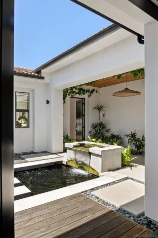 a view of a living room and kitchen