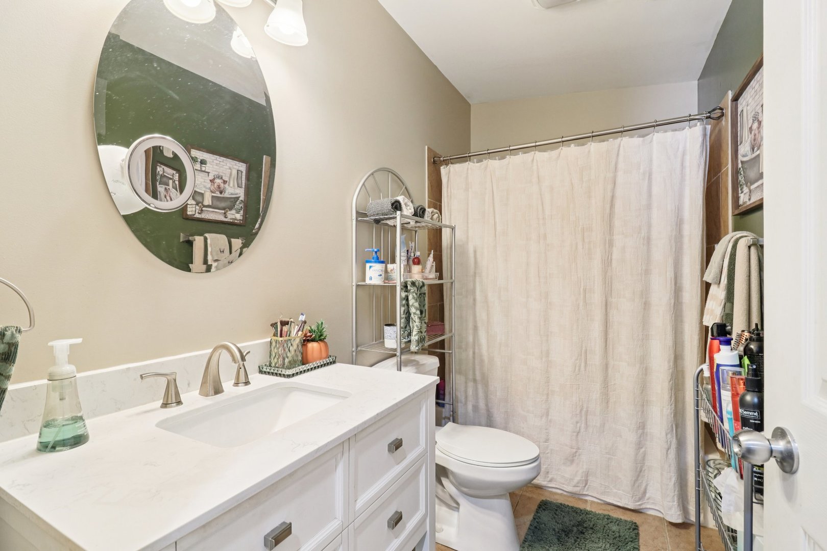 11 Highview Avenue Fox Lake, IL 60020 - Photo 15 of 32 a bathroom with a sink toilet and a mirror
