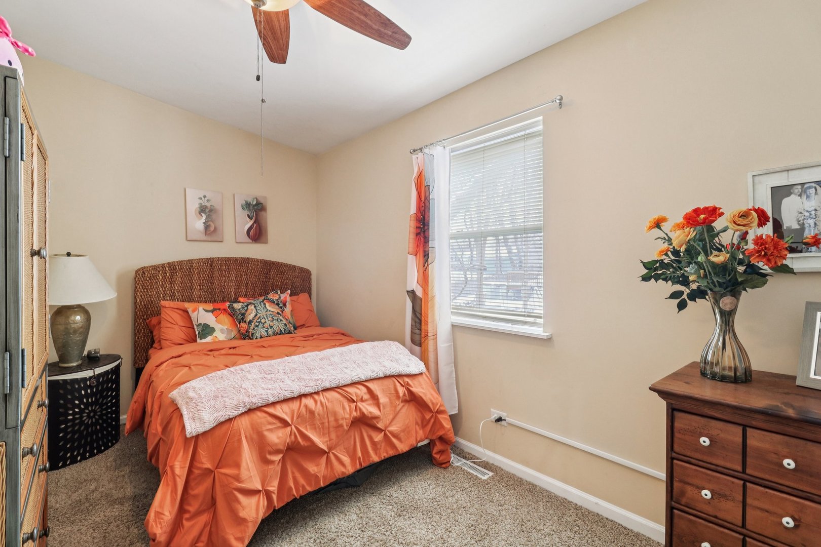 11 Highview Avenue Fox Lake, IL 60020 - Photo 16 of 32 a bedroom with a bed and a chandelier