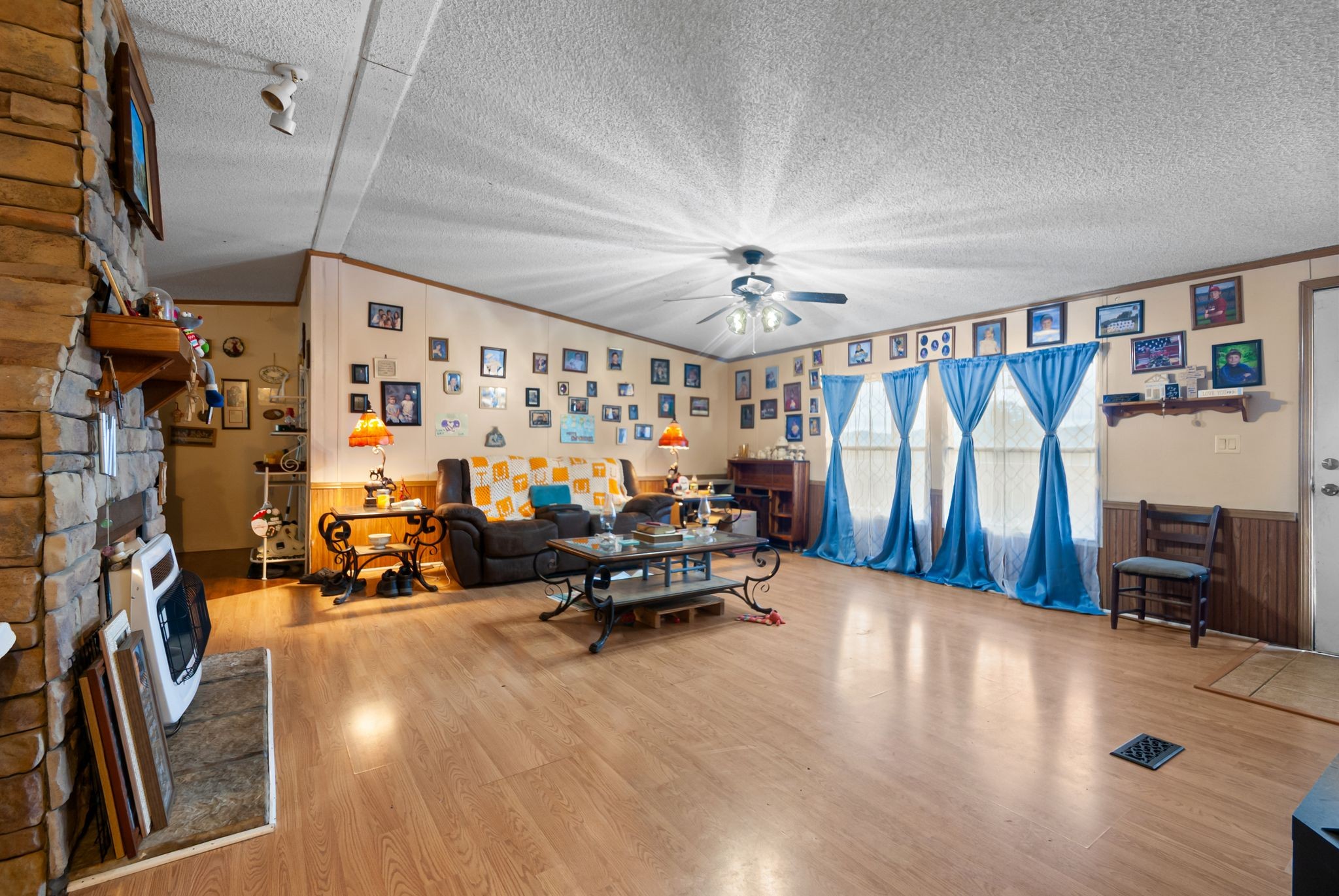 3300 Fishing Ford Road Petersburg, TN 37144 - Photo 14 of 30 a living room with furniture and a chandelier