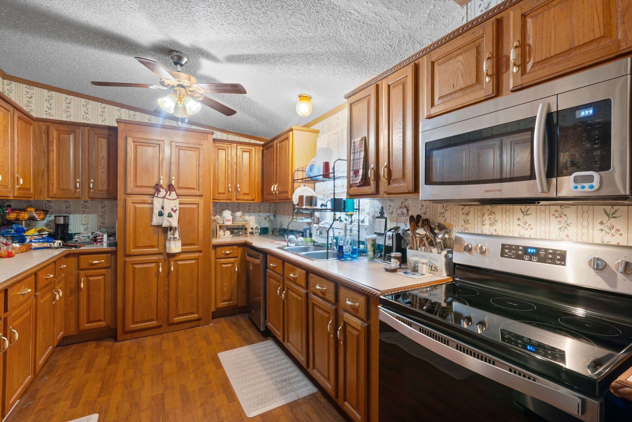 3300 Fishing Ford Road Petersburg, TN 37144 - Photo 17 of 30 a kitchen with stainless steel appliances granite countertop a stove cabinets and microwave