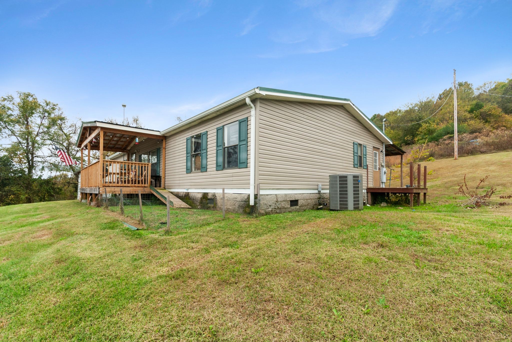 3300 Fishing Ford Road Petersburg, TN 37144 - Photo 9 of 30 a backyard of a house with table and chairs