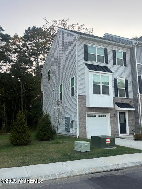 1 Halifax Road Bayville, NJ 08721 - Photo 3 of 45 a view of a yard in front of a building