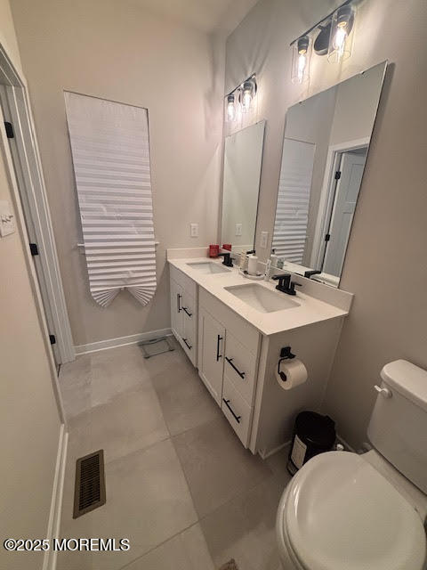 1 Halifax Road Bayville, NJ 08721 - Photo 44 of 45 a bathroom with a sink a toilet a mirror and shower