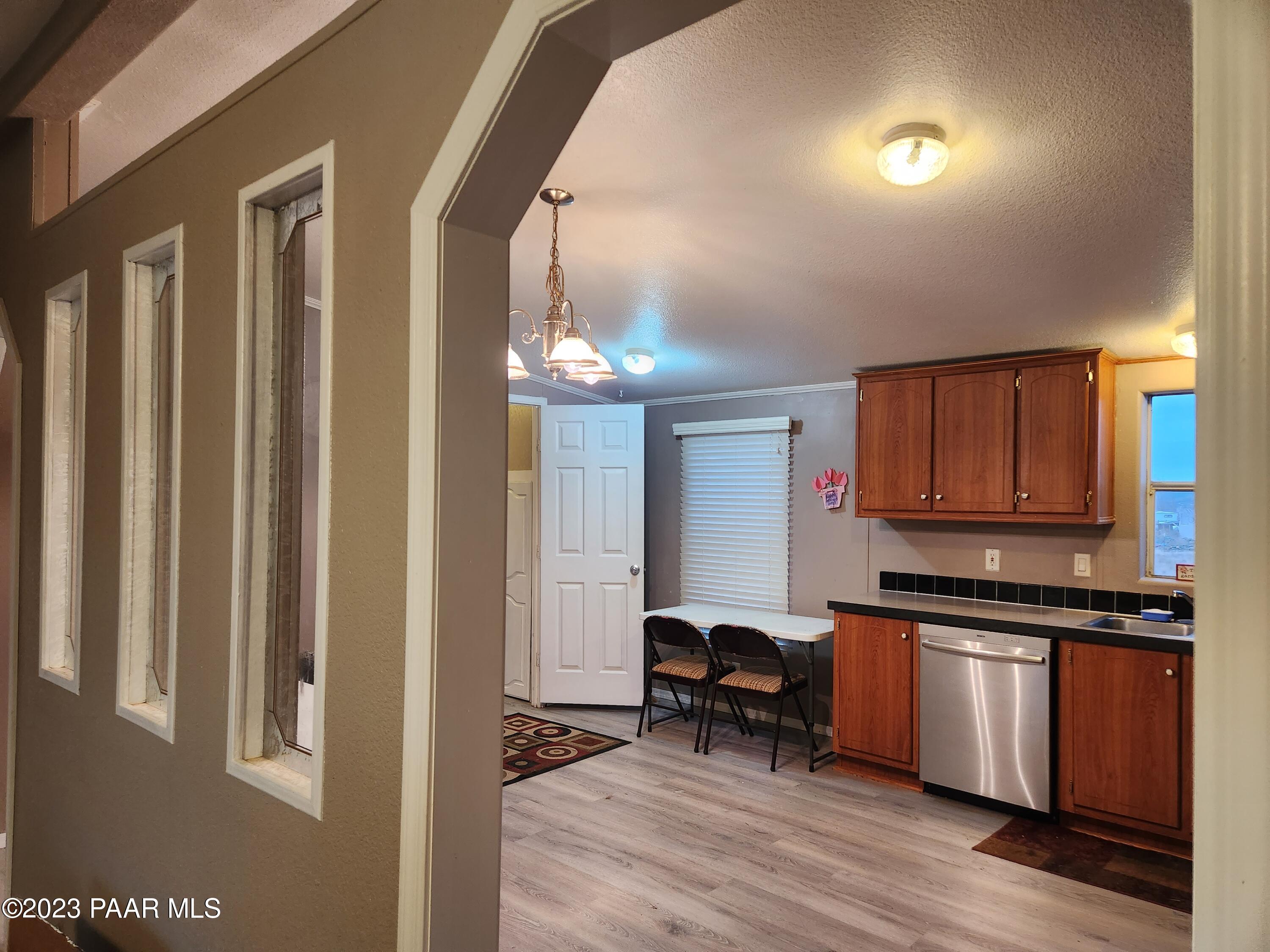 800 Sharon Road Chino Valley, AZ 86323 - Photo 4 of 25 view 2 into kitchen