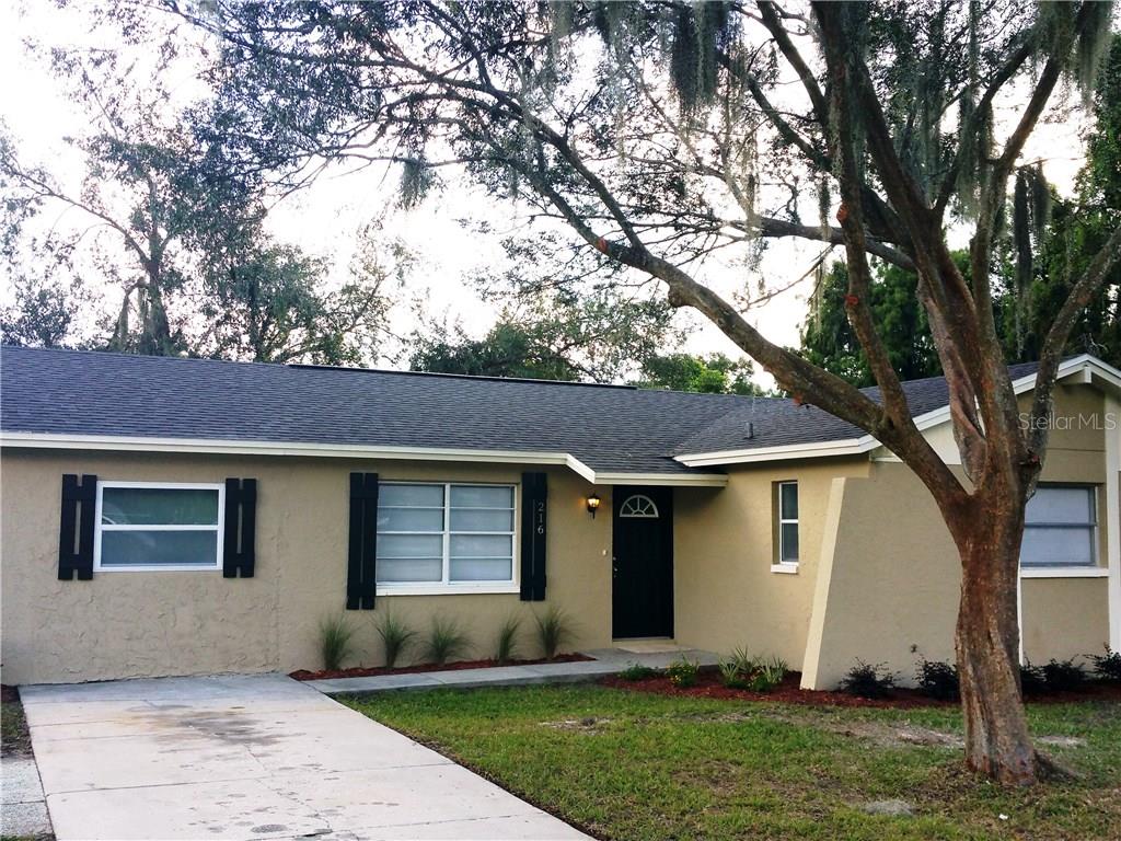 216 West Wheeler Road Seffner, FL 33584 - Photo 1 of 1 a view of a house with a yard