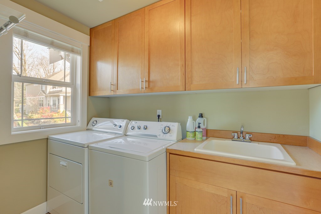 1205 North 27th Place Renton, WA 98056 - Photo 29 of 37 a utility room with dryer and washer