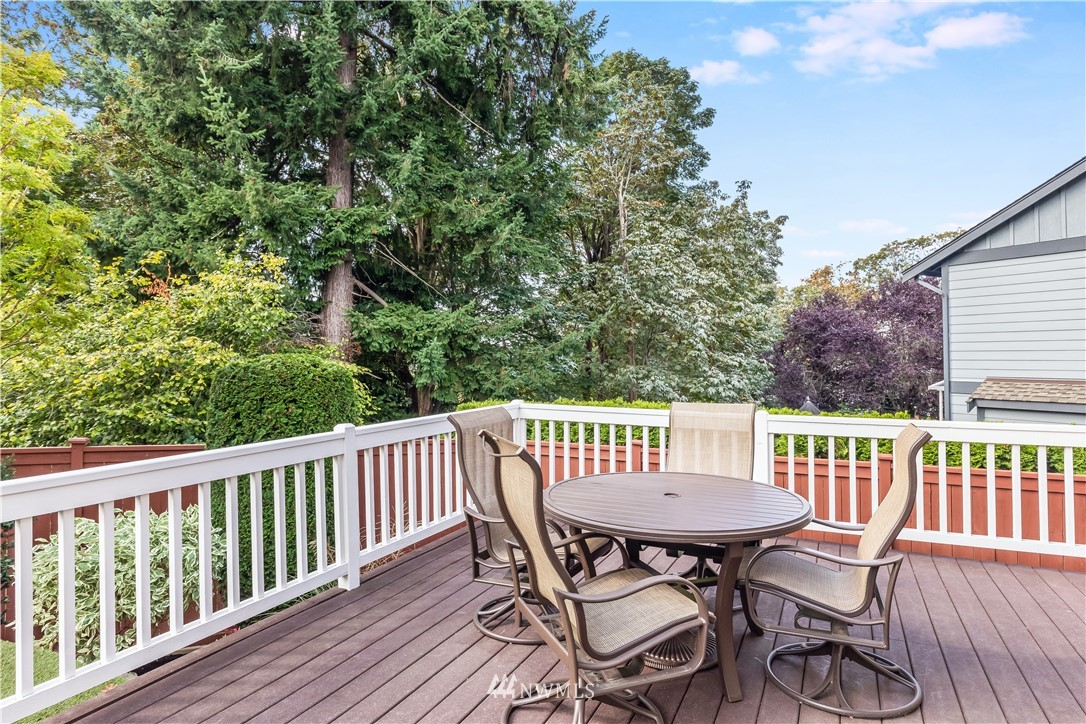 1205 North 27th Place Renton, WA 98056 - Photo 35 of 37 a view of a table and chairs on the roof deck