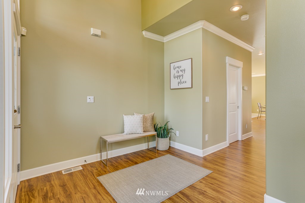 1205 North 27th Place Renton, WA 98056 - Photo 5 of 37 a living room with a rug and wooden floor