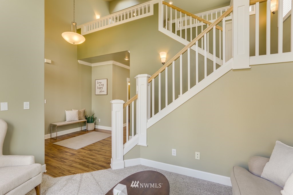 1205 North 27th Place Renton, WA 98056 - Photo 8 of 37 a view of an entryway with wooden floor