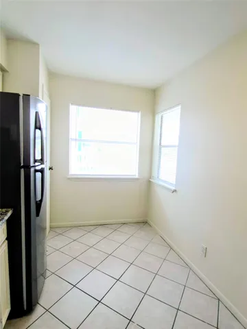 a view of a kitchen with a window